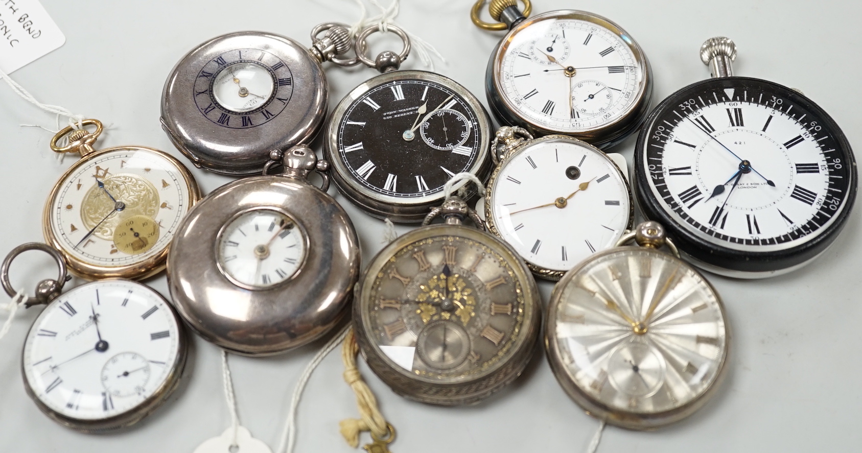 Ten assorted silver or base metal pocket watches including John Walker black dial and a deck watch by H. Golay & Son.